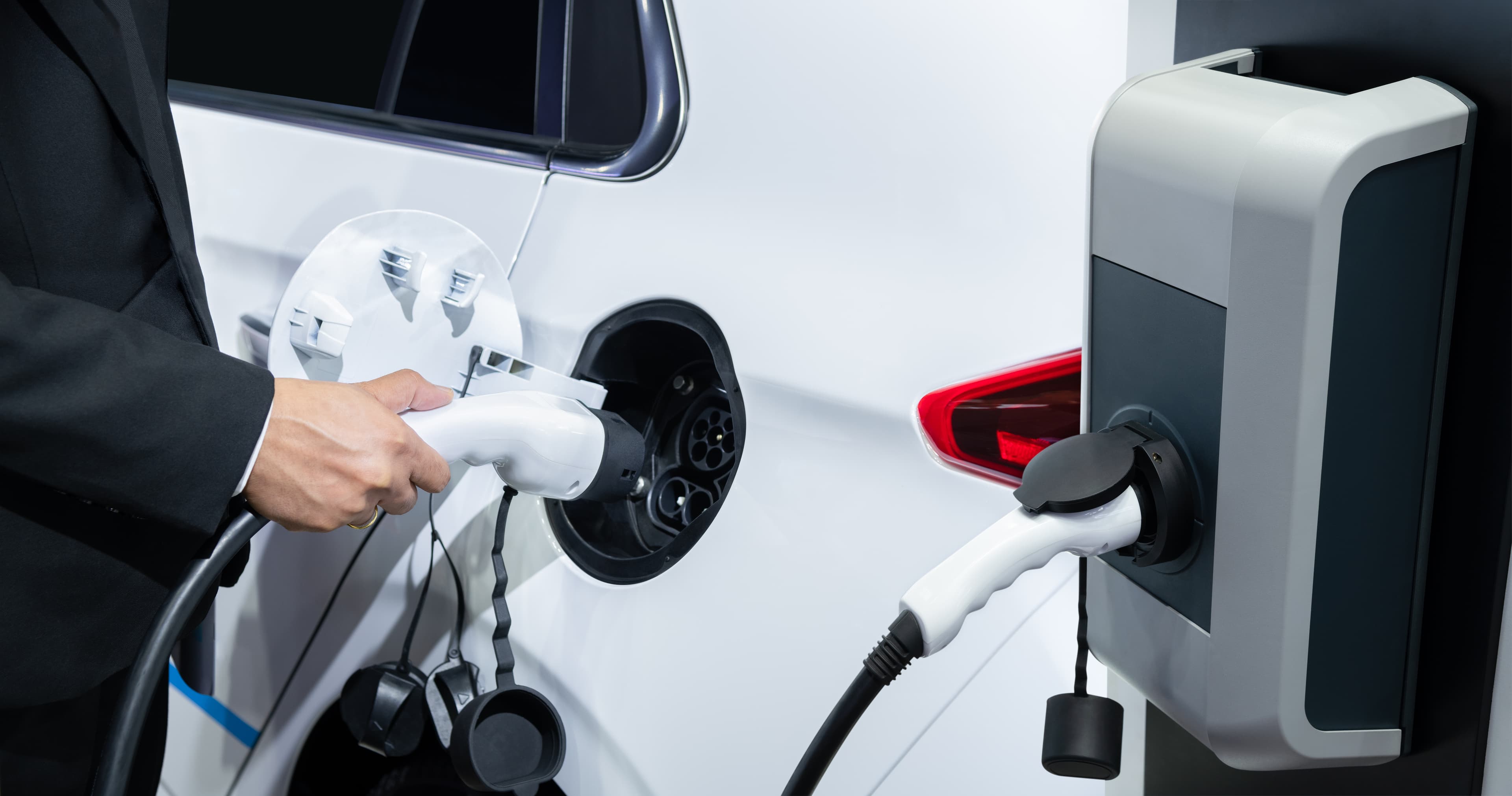 Charging white car