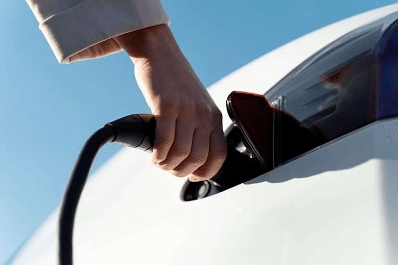 EV charging white car